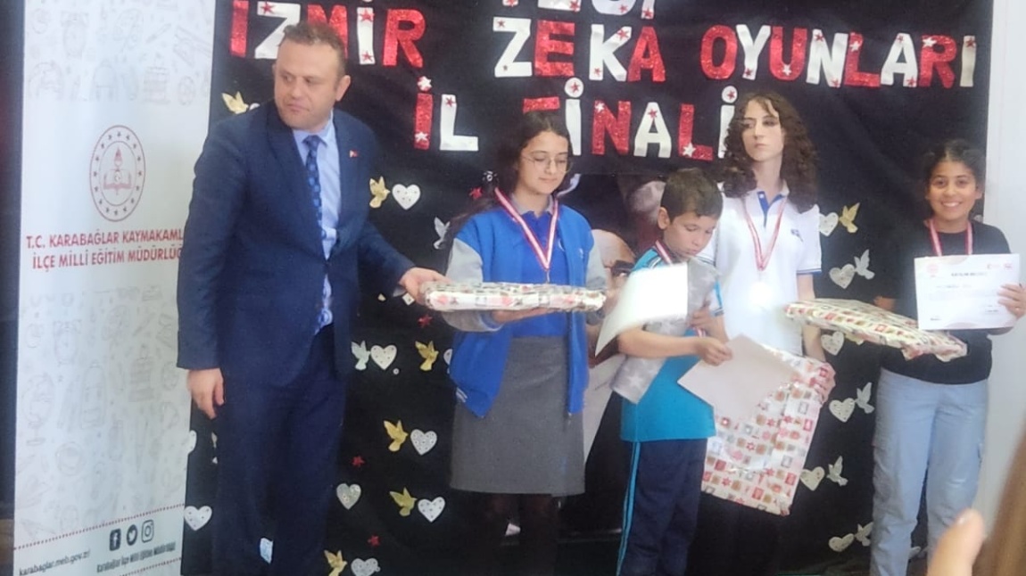 Öğrencimiz Hasibe Ecrin GÜRBÜZ İzmir'de  yapılan Akıl ve Zeka Oyunları Turnuvasında Reversi dalında İzmir İl 2. olmuştur.
